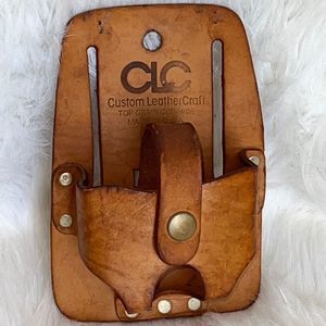 Hardware brown leather belted  holder Excellent